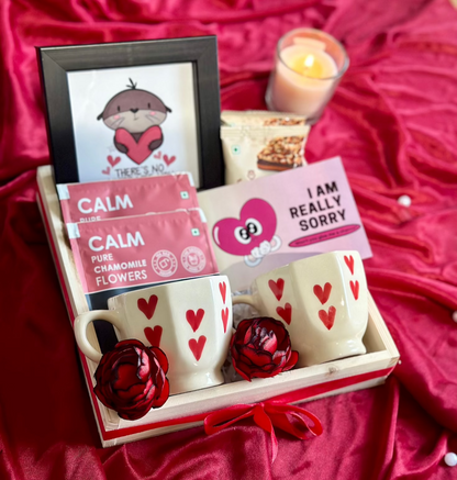 "I am sorry" hamper which contains 
Mini Pinewood Organizer, 2 Mini Heart Cups, Loykaa Almond Brittle (set of 2)
Photo Frame, 2 Calm Tea Sachets
"I am sorry" Gift Card, Red Ribbon Bow and Artifical Red Decorative Flowers